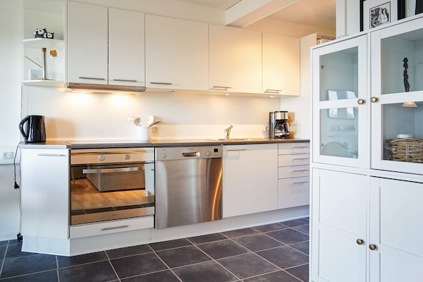 Foto van 5 persoons vakantie huis op een vakantie park in Gudhjem - Indoor