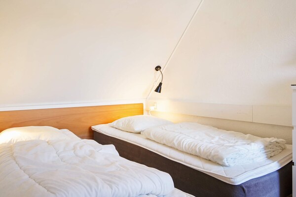 Foto van 5 persoons vakantie huis op een vakantie park in Gudhjem - Indoor