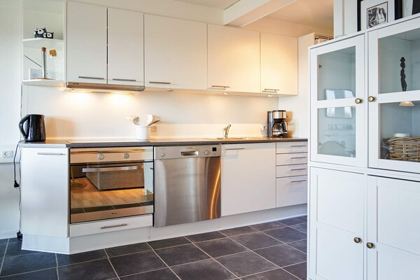 Foto van 5 persoons vakantie huis op een vakantie park in Gudhjem - Indoor