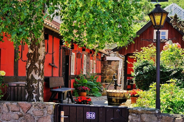 Foto van 5 persoons vakantie huis op een vakantie park in Gudhjem - Outdoor