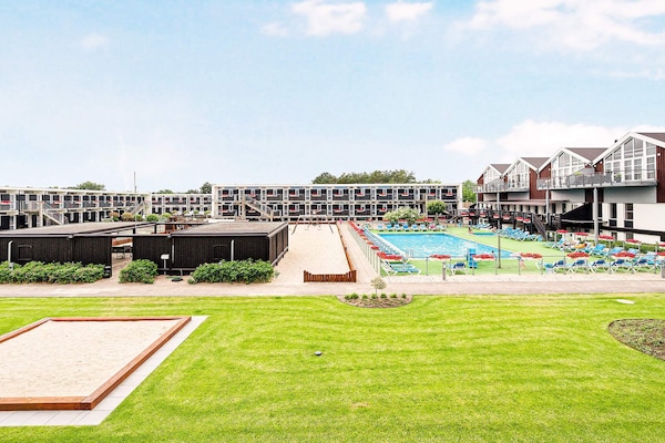 Foto van 4 persoons vakantie huis op een vakantie park in Glesborg - Outdoor