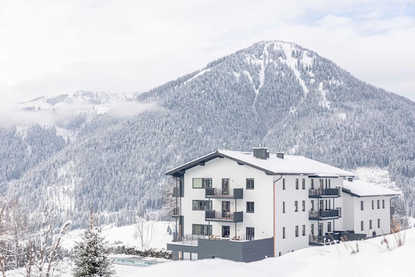 Foto van Appartement met gedeeld infinity zwembad - Vakantiehuis in St. Martin am Tennengebirge - ExteriorWinter