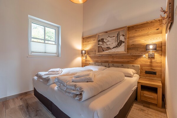 Foto van Luxe chalet met sauna bij het zwemmeer - Vakantiehuis in Uttendorf - BedRoom