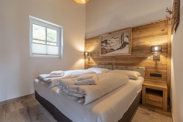 Foto van Luxe chalet met sauna bij het zwemmeer - Vakantiehuis in Uttendorf - BedRoom