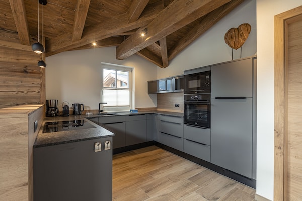 Foto van Luxe chalet met sauna bij het zwemmeer - Vakantiehuis in Uttendorf - Kitchen