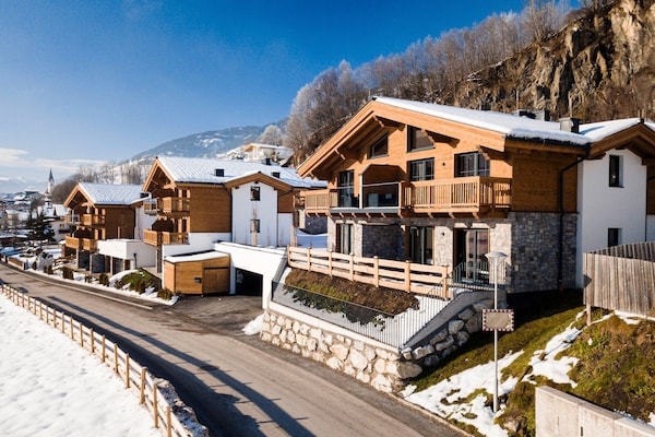 Foto van Luxe chalet met sauna bij het zwemmeer - Vakantiehuis in Uttendorf - ExteriorWinter