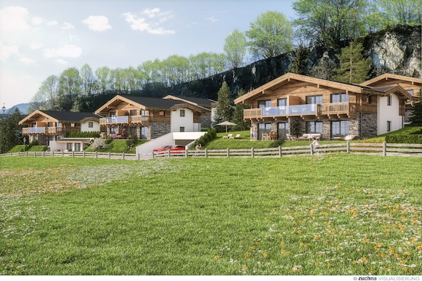 Foto van Luxe chalet met prive sauna, nabij een zwemmeer - Vakantiehuis in Uttendorf - ExteriorSummer