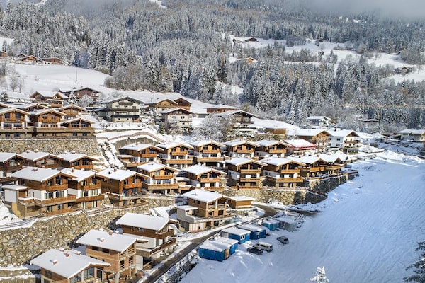 Foto van Chalet in Neukirchen bij Wildkogel Arena - Vakantiehuis in Neukirchen am Grossvenediger - ExteriorWinter