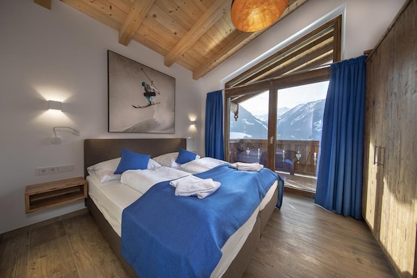 Foto van Alpine Chalet met Ski-In toegang - Vakantiehuis in Neukirchen - BedRoom