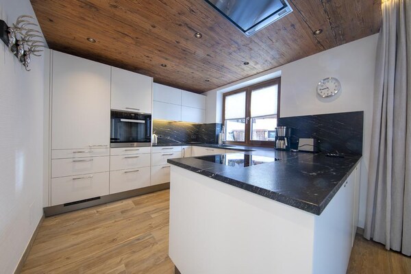 Foto van Alpine Chalet met Ski-In toegang - Vakantiehuis in Neukirchen - Kitchen