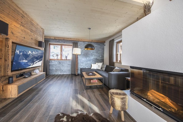 Foto van Alpenchalet met uitzicht op de bergen - Vakantiehuis in Neukirchen - LivingRoom