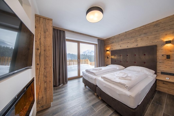 Foto van Alpenchalet met uitzicht op de bergen - Vakantiehuis in Neukirchen - BedRoom