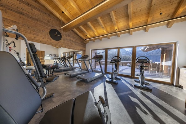 Foto van Alpenchalet met uitzicht op de bergen - Vakantiehuis in Neukirchen - gym