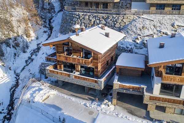 Foto van Chalet in Neukirchen bij Skilift - Vakantiehuis in Neukirchen - ExteriorWinter
