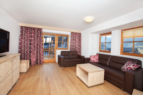 Foto van Appartement Wald im Pinzgau bij Skilift - Vakantiehuis in Wald im Pinzgau - LivingRoom