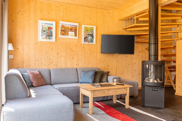 Foto van Modern chalet met whirlpool - Vakantiehuis in Sankt Georgen am Kresichberg - LivingRoom