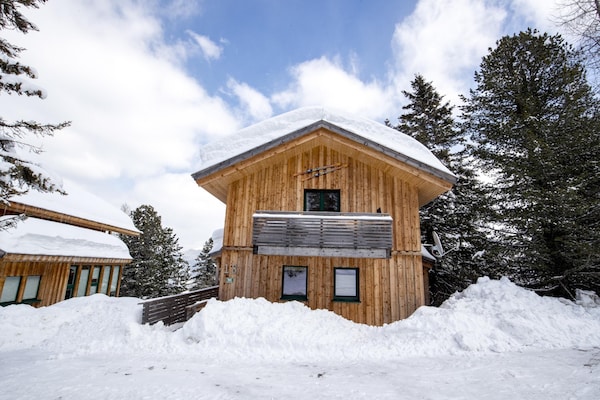 Foto van Chalet in Oostenrijk bij Skipistes & Sauna - Vakantiehuis in Turracherhöhe - ExteriorWinter