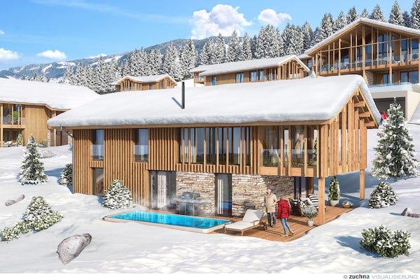 Foto van Majestueus chalet met zwembad en sauna - Vakantiehuis in Ennsling - ExteriorWinter