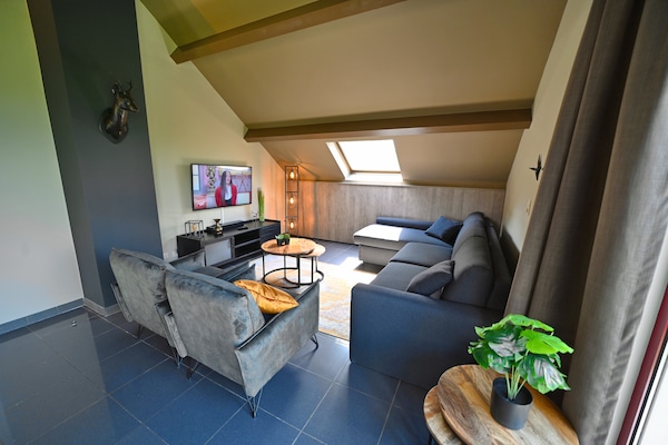 Foto van Appartement in België met Tuinterras - Vakantiehuis in Durbuy - LivingRoom