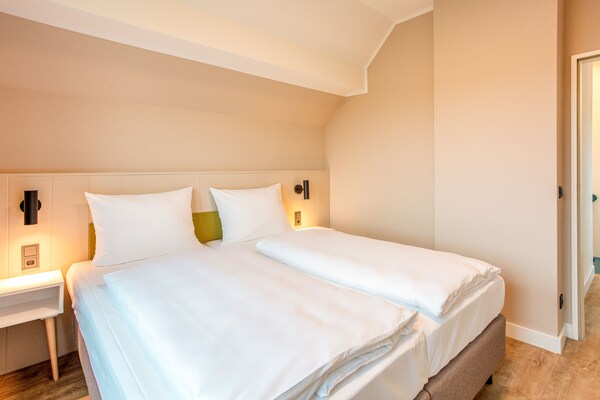 Foto van Vakantiecomplex BEECH Resort Fleesensee, Göhren-Lebbin - BedRoom