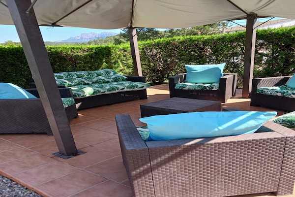 Foto van Gezellige cottage in Catalonië nabij meer - Vakantiehuis in Sant Salvador de Guardiola - TerraceBalcony