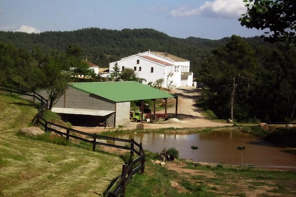 Foto van Huisje in Cataloniכ met zwembad en tuin - Vakantiehuis in Sant Salvador de Guardiola - AreaSummer1KM
