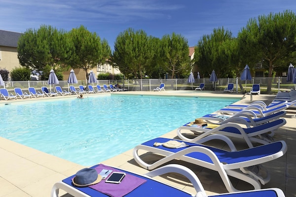 Foto van Appartement in Frankrijk met Uitzicht op Zwembad - Vakantiehuis in Montignac - PoolOfHouse