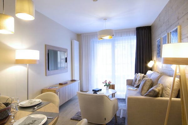 Foto van Appartement in Éclose met Bergzicht - Vakantiehuis in Huez - LivingRoom