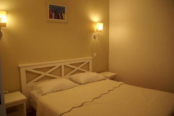 Foto van Appartement aan zee met zwembad - Vakantiehuis in Guidel - BedRoom