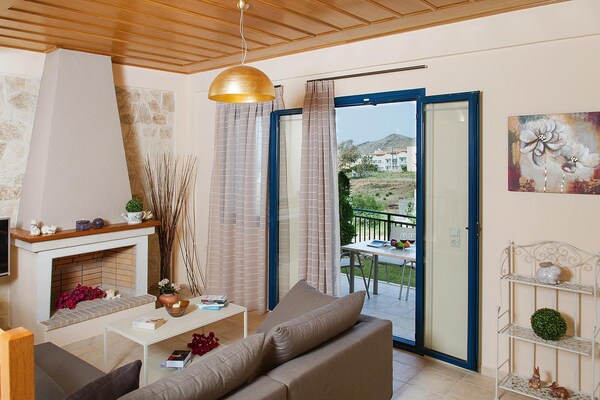 Foto van Vakantiehuisje aan het zwembad in Panormo - Vakantiehuis in Panormo - LivingRoom