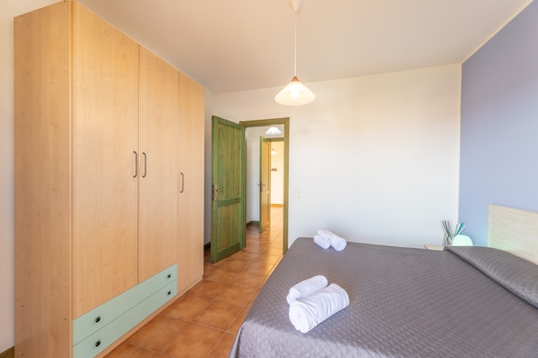 Foto van Ruim appartement vlakbij strand en zwembad - Vakantiehuis in Santa Teresa Gallura (SS) - BedRoom
