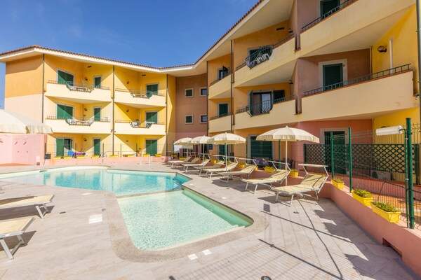 Foto van Ruim appartement vlakbij strand en zwembad - Vakantiehuis in Santa Teresa Gallura (SS) - Pool