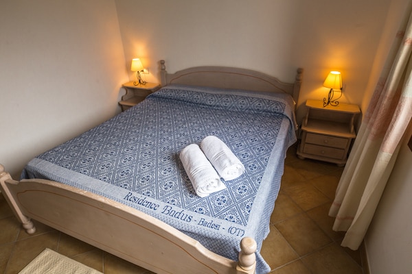 Foto van Appartement met zwembad in Badus Resort - Vakantiehuis in Badesi - BedRoom