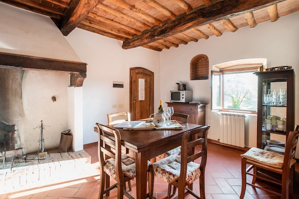 Foto van Wijnproeverijen, heuvels en Toscaanse huizen - Vakantiehuis in San Casciano in Val di Pesa - DiningRoom