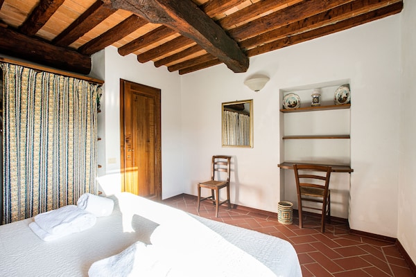Foto van Wijnproeverijen, heuvels en Toscaanse huizen - Vakantiehuis in San Casciano in Val di Pesa - BedRoom
