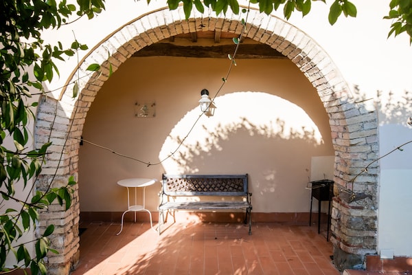 Foto van Wijnproeverijen, heuvels en Toscaanse huizen - Vakantiehuis in San Casciano in Val di Pesa - TerraceBalcony