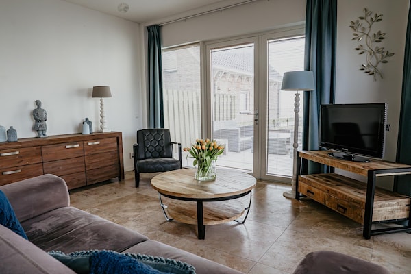 Foto van Appartement in Egmond met Uitzicht op Zee - Vakantiehuis in Egmond aan zee - LivingRoom