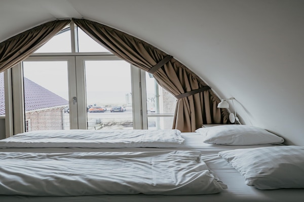 Foto van Appartement in Egmond met Uitzicht op Zee - Vakantiehuis in Egmond aan zee - BedRoom