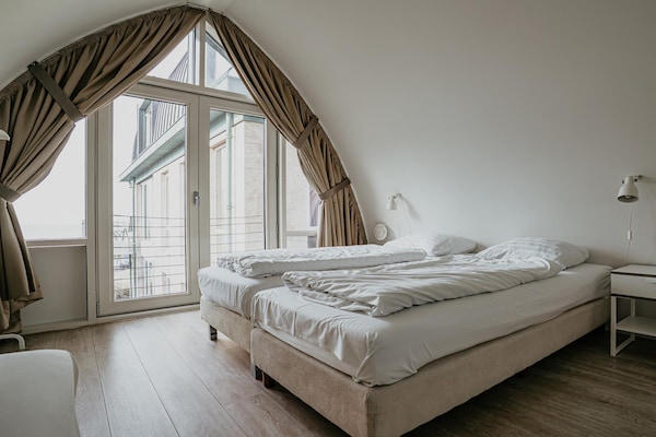 Foto van Appartement in Egmond met Uitzicht op Zee - Vakantiehuis in Egmond aan zee - BedRoom