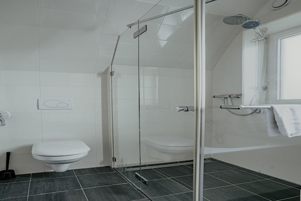Foto van Appartement in Egmond met Uitzicht op Zee - Vakantiehuis in Egmond aan zee - BathRoom