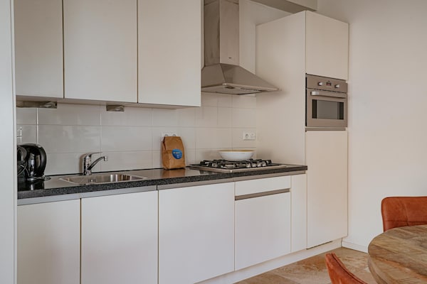Foto van Appartement in Egmond met Uitzicht op Zee - Vakantiehuis in Egmond aan zee - Kitchen