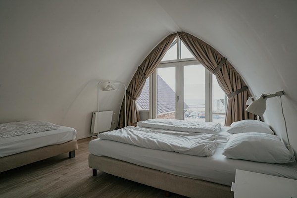 Foto van Appartement in Egmond met Uitzicht op Zee - Vakantiehuis in Egmond aan zee - BedRoom