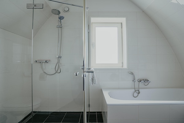 Foto van Appartement in Egmond met Uitzicht op Zee - Vakantiehuis in Egmond aan zee - BathRoom