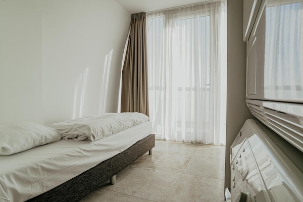 Foto van Appartement in Egmond met Uitzicht op Zee - Vakantiehuis in Egmond aan zee - BedRoom