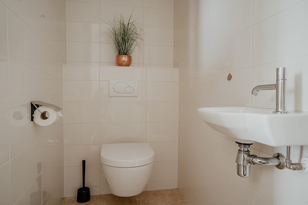 Foto van Appartement in Egmond met Uitzicht op Zee - Vakantiehuis in Egmond aan zee - BathRoom