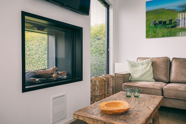 Foto van Bungalow in Ouddorp met Uitzicht op Natuur - Vakantiehuis in Herkingen - LivingRoom