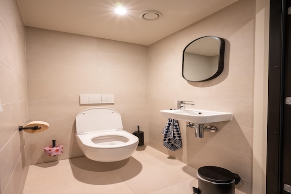 Foto van Forest Lodge met hottub - Vakantiehuis in Zeewolde - BathRoom