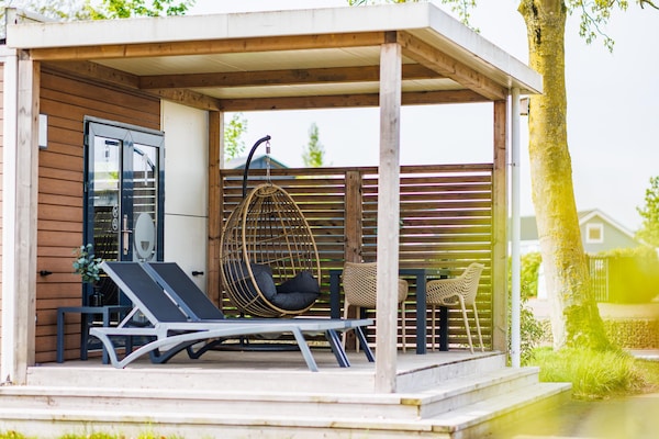Foto van Huisdiervriendelijk verblijf in een lodge - Vakantiehuis in Maurik - TerraceBalcony