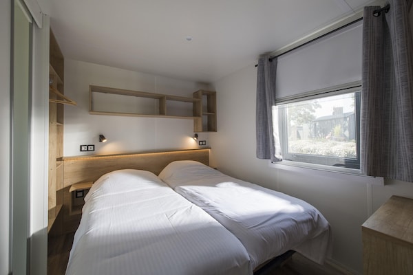 Foto van Huisdiervriendelijk verblijf in een lodge - Vakantiehuis in Maurik - BedRoom