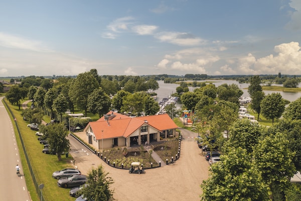 Foto van Gezellige ontsnapping aan de rivier - Vakantiehuis in Maurik - AreaSummer1KM
